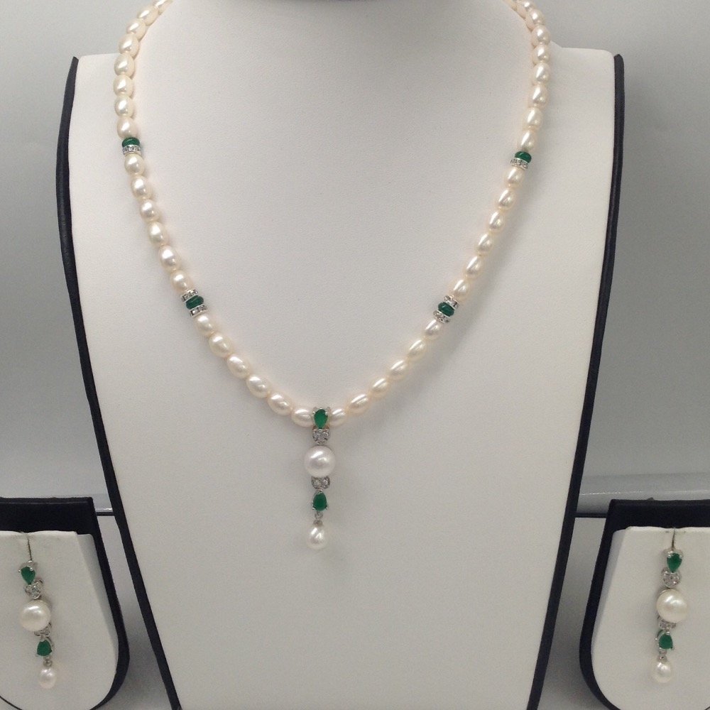 White pearls pendent set with oval ...