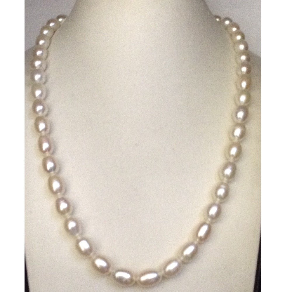 Freshwater white oval pearls strand...