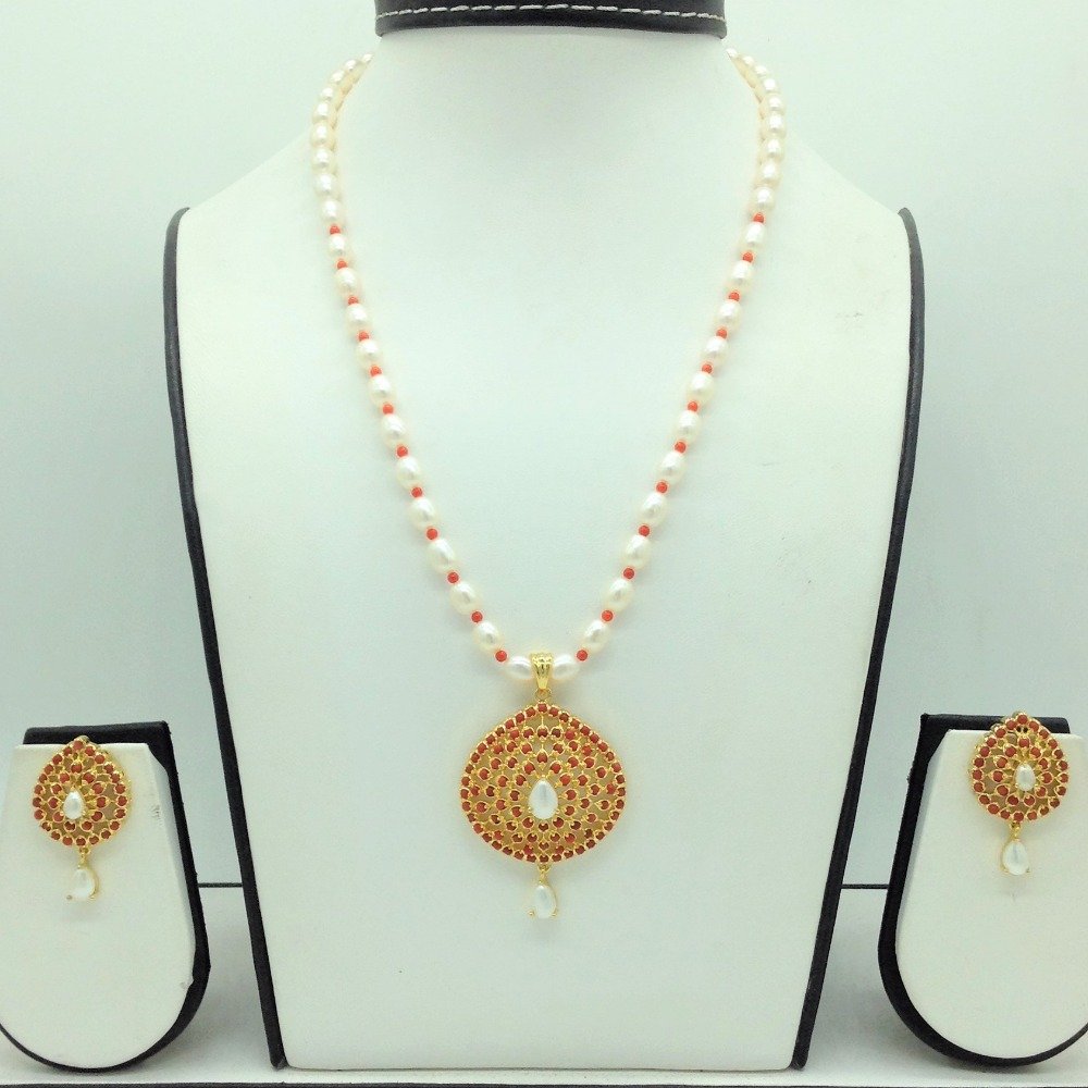 Pearls and coral pendent set with 1...